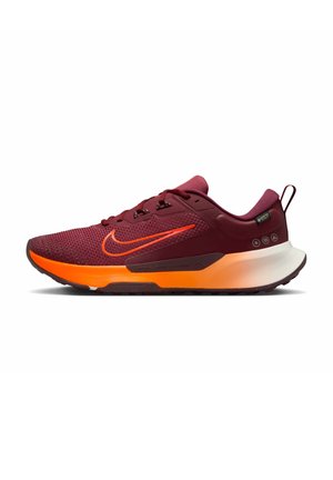 Maroon and orange Nike running shoe with mesh upper, lace-up closure, and thick white sole with traction tread.