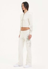 Ed Hardy BATTLE DRAGON FLARED - Pantaloni sportivi - white