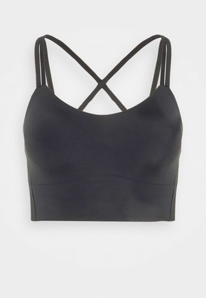 Fekete sportról van szó, amely letisztult dizájnnal, keresztbe tett vékony pántokkal, sima textúrával és testhezálló fazonnal rendelkezik.