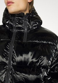 Calvin Klein Jeans Zimní bunda - black