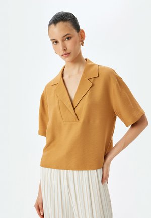 Blusa - brown