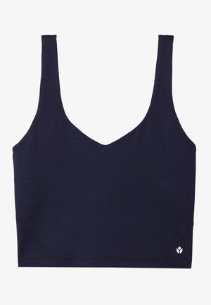 Temno modra športna bralette s V-izrezom, širokimi naramnicami, gladko teksturo in majhnim logotipom na spodnjem desnem delu.