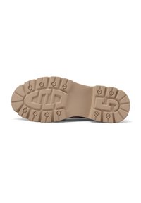 Suola di scarpa in gomma di colore beige chiaro. Presenta scanalature profonde e motivi circolari in rilievo per trazione. Rinforzata nel tallone e nella punta.
