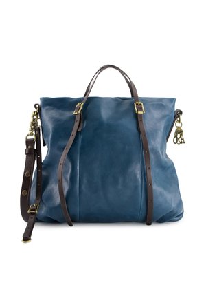 Große blaue Leder-Tote mit dunkelbraunen verstellbaren Trägern, ausgestattet mit Messingbeschlägen und einem Reißverschlussoberteil, glatter Textur und minimaler Ausführung.