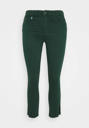 Jeans verdes ajustados de algodón elástico, con una cintura alta, dos bolsillos frontales y aberturas laterales en el dobladillo para un detalle adicional.