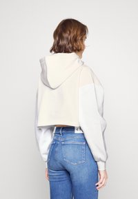 Calvin Klein Jeans SHINY INSTITUTIONAL HOODIE - Sweatshirt - bright white