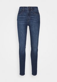 UNIVERSAL WALKER - Calças de ganga de corte skinny - dark indigo