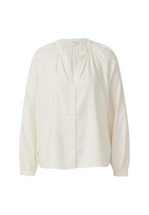 Lange mouwen, crèmekleurige blouse van lichtgewicht stof. Heeft een knoopsluiting aan de voorkant en geplooide details bij de halslijn en mouwen.