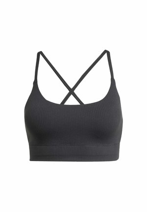 Bralette nera a costine con spalline incrociate regolabili. Realizzata in tessuto elasticizzato, presenta una banda sottostante ampia per un supporto aggiuntivo.