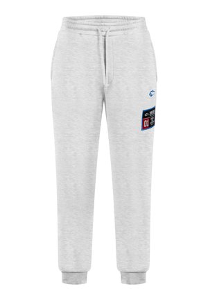 Grijze sweatpants van zacht materiaal, met een elastische tailleband, trekkoord en een zijpatch met kleurrijke tekst en afbeeldingen.
