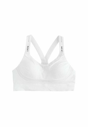 Sutien sport alb căptușit, cu bretele elastice cu eticheta „NEXT ACTIVE”, având un design racerback.
