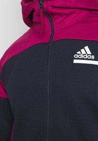 adidas Performance Felpa con zip - dark blue