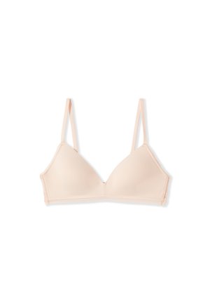 Reggiseno wireless beige chiaro con coppe a triangolo e spalline sottili regolabili, posato su uno sfondo bianco.