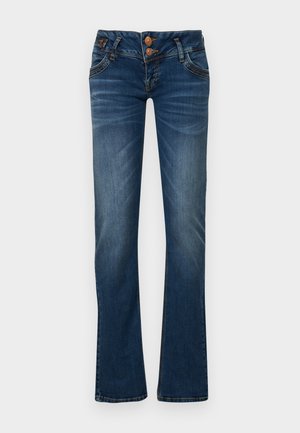 Flared blue jeans made of denim. Features two-button closure, front pockets, and subtle fading. Hem finishes with a stitching detail.