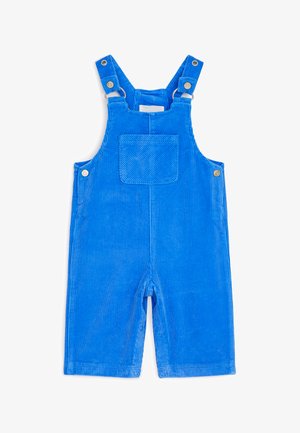 Salopette bébé en velours côtelé bleu vif avec poche avant, bretelles réglables et fermetures pressionnées aux jambes et sur les côtés.