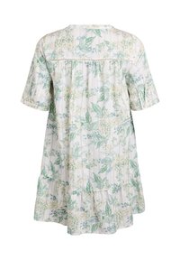 Robe florale en tissu léger avec des motifs verts et jaunes, manches courtes et ourlet à volants. Vue de dos montrée.
