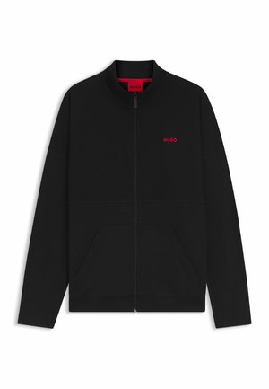 Black zip-up jacket made of textured fabric. Features a round neckline, two front pockets, and a small red "HUGO" logo on the chest.