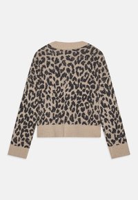 Beige stickad tröja med svart leopardmönster, kort design, ribbade ärmslut och fåll, samt rund halsringning.