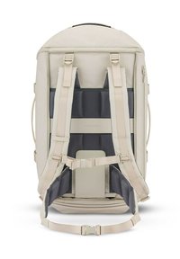Zaino beige con schienale grigio imbottito, spallacci regolabili e più scomparti. Materiale resistente, forma affusolata e cerniere.