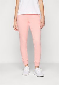 adidas Sportswear ESSENTIALS LINEAR CUFFED - Treniņtērpa apakšdaļas - semi pink spark