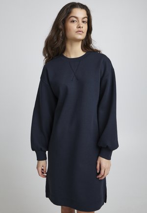 Marineblaues Sweatshirtkleid, lange Ärmel mit gerafften Bündchen, lockere Passform, runder Halsausschnitt, seitliche Schlitze am Saum, weicher Stoff.