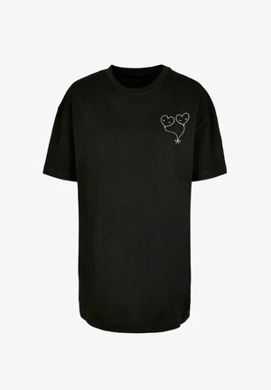 Schwarzes Baumwoll-T-Shirt mit kurzen Ärmeln. Es verfügt über ein weißes, liniengezeichnetes Ballon-Design mit zwei Herzen auf der linken Brustseite. Schlichte und lässige Form.