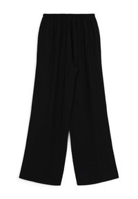 Pantalons larges noirs avec une taille élastique, fabriqués en tissu doux. Présente une coupe décontractée et un design simple, sans ornements.