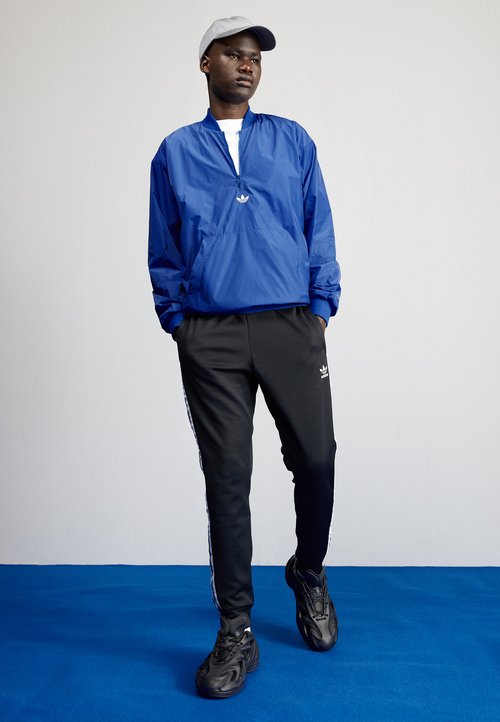 adidas Adicolor Classics SST Track Pants Black/White — foto 2