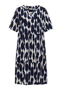 Robe à manches courtes avec jupe à volants imprimée léopard abstrait noir et blanc et décolleté en V.