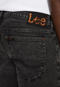 Lee Jean slim - grey denim
