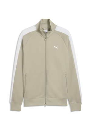 Beige Puma Reißverschlussjacke mit weißen Schulterstreifen, geripptem Kragen und Bündchen, seitlichen Reißverschlusstaschen und Puma-Logo auf der Brust.