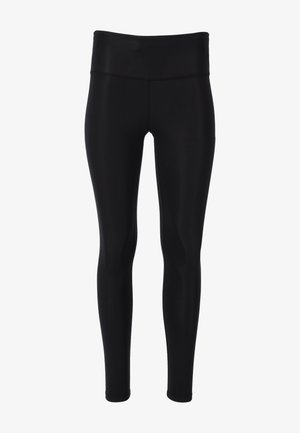 Svarta leggings tillverkade av glattt, elastiskt tyg. Hög midja med en sömlös design som sitter tajt runt benen. Inga ytterligare detaljer.