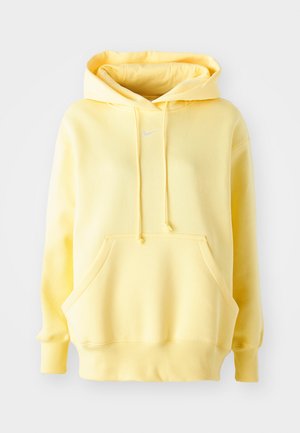 Yellow hoodie made of soft fabric, featuring a front pocket, drawstrings, and a white logo on the chest. Long sleeves and ribbed cuffs.
