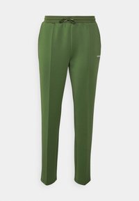 Groene sweatpants van zachte stof, met een elastische tailleband met een trekkoord en zijnaadzakken. Eenvoudig, recht gesneden ontwerp.
