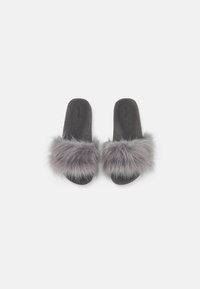 Faux fur slides with a soft gray upper and black rubber sole, featuring a wide furry band and contoured footbed design.