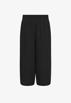 Pantalon noir ample et court avec taille élastique et tissu légèrement texturé, conçu pour un port décontracté confortable.