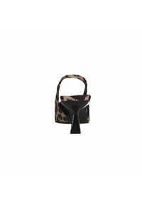 High-heeled sandal in brown and beige animal print fabric. Features an open back, narrow strap, and a distinctive stiletto heel.