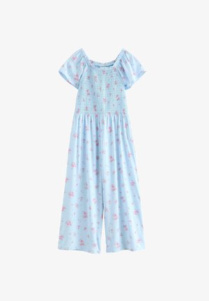 Vaaleansininen haalaripuku, jossa on lyhyet hihat, kiristysnyöritys yläosassa, leveät lahkeet ja vaaleanpunainen kukkakuvio kaikkialla.