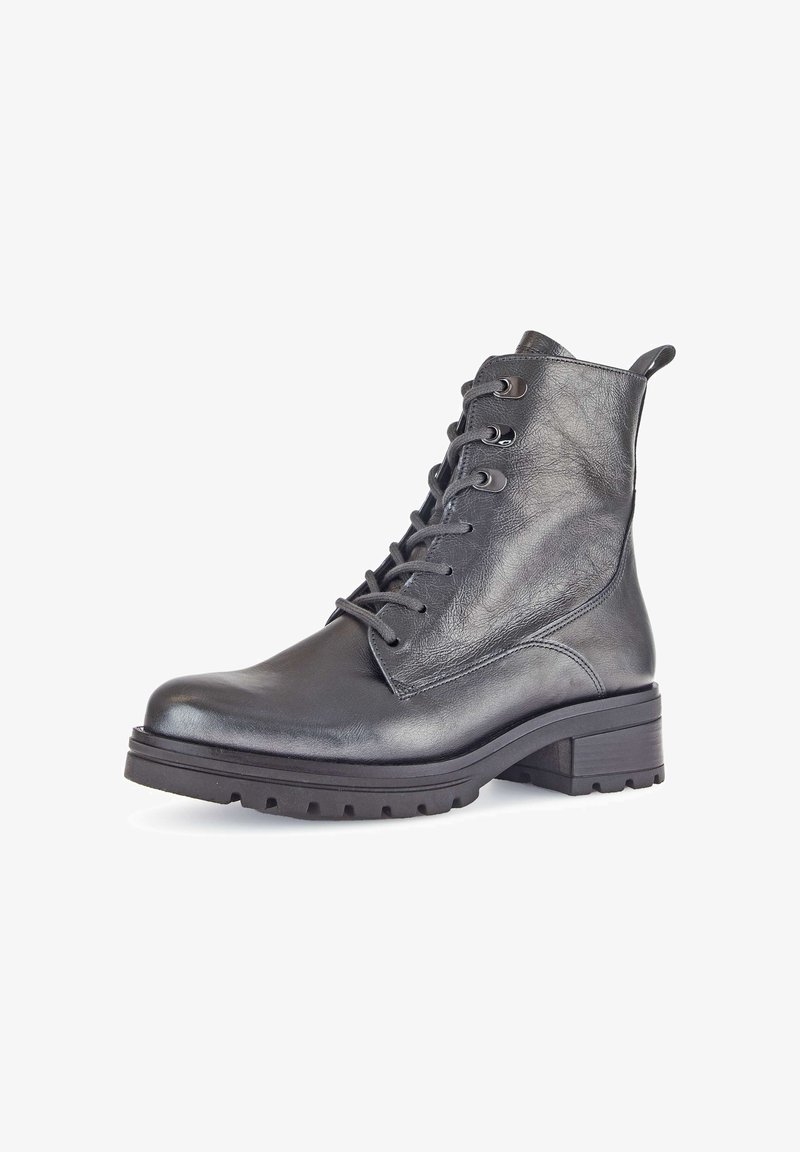 Bottes de cheville en cuir noir avec un bout rond, laçage à l'avant et une finition texturée. Elles sont dotées d'un talon épais et d'une semelle en caoutchouc robuste.