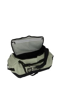 Duffle bag in light green fabric with black accents; features a large opening, mesh pocket, and dual carrying handles.