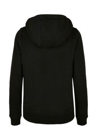 Sweat à capuche noir avec un cordon de serrage, texture douce, manches longues et ourlet arrondi. Dispose d'une poche kangourou à l'avant.