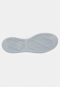 White rubber shoe sole with textured grooves and ridges, featuring the "Camper" logo and size markings. Smooth, flexible material.