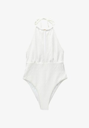 White one-piece swimsuit featuring a textured diamond pattern, high neckline, cutout front, and adjustable tie straps at the back.