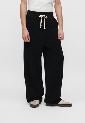 Atelier de roupa, LANIK PANTS UNISEX - Pantalon de survêtement - black