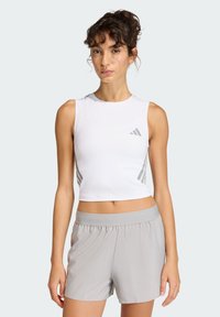 White sleeveless athletic top with gray side stripes, paired with light gray shorts featuring an elastic waistband and smooth texture.