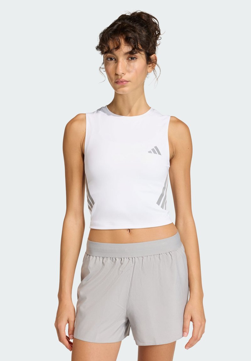 White sleeveless athletic top with gray side stripes, paired with light gray shorts featuring an elastic waistband and smooth texture.