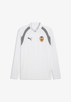 Hvid langærmet sportstop med grå skulderpaneler, lynlås foran, Puma-logo til højre og Valencia CF fodboldklubs logo til venstre.