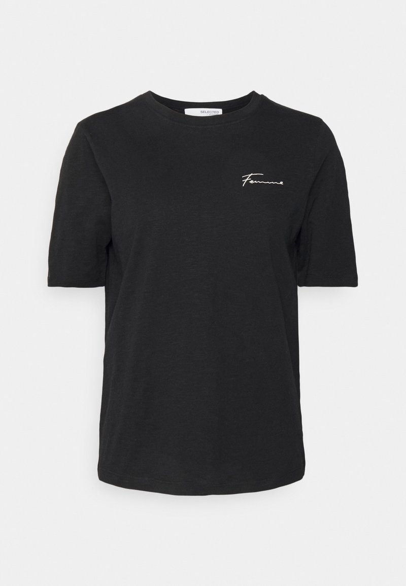T-shirt noir à manches courtes col rond avec texte manuscrit blanc "Femme" sur la poitrine gauche.
