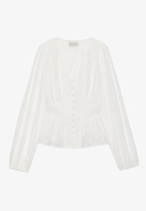 Witte blouse met lange mouwen, ronde halslijn en knoopsluiting. Heeft een subtiele bloemenstructuur en een peplumzoom voor extra vorm.