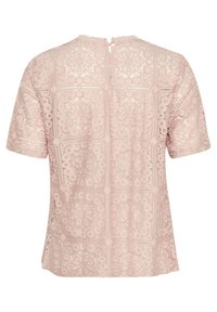 Top in pizzo rosa con maniche corte, caratterizzato da un motivo floreale, orlo intagliato e chiusura a bottone nella parte posteriore del collo. Tessuto leggero.